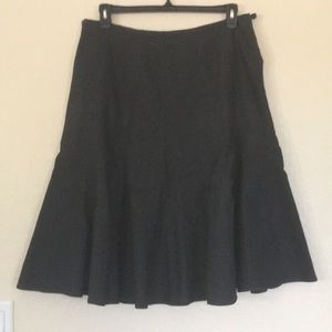 Black denim a-line midi-skirt.